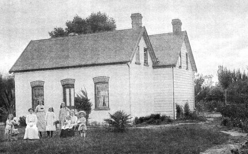 50 Langdons Road - Nellie with 7 daughters picture back of house shortly after purchase.