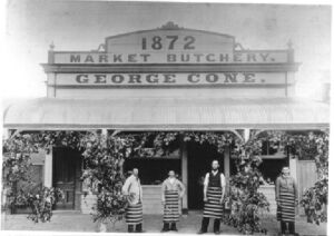 Son George Herbert Cone, 2nd from right, later took over the business from his father and sold it in 1909