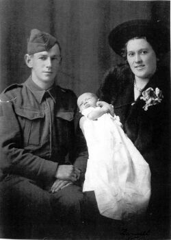 Doug Wright home on compassionate leave, baby Barry aged 3 weeks and Bertha